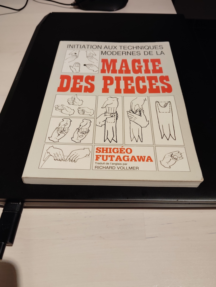 Initiation aux techniques modernes de la magie des pièces 