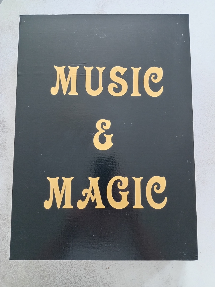 Appearing Guitar From Book