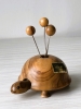 Support pique-assiettes en bois d'olivier tortue et ses pique-assiettes.