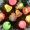 Guirlande lumineuse vintage, pommes de pin, boules et cloches 