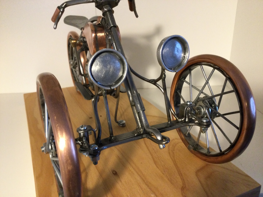 Vintage three wheeled motorcycle 