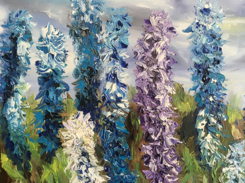 Floral art. Delphiniums in a park. Wild flowers.