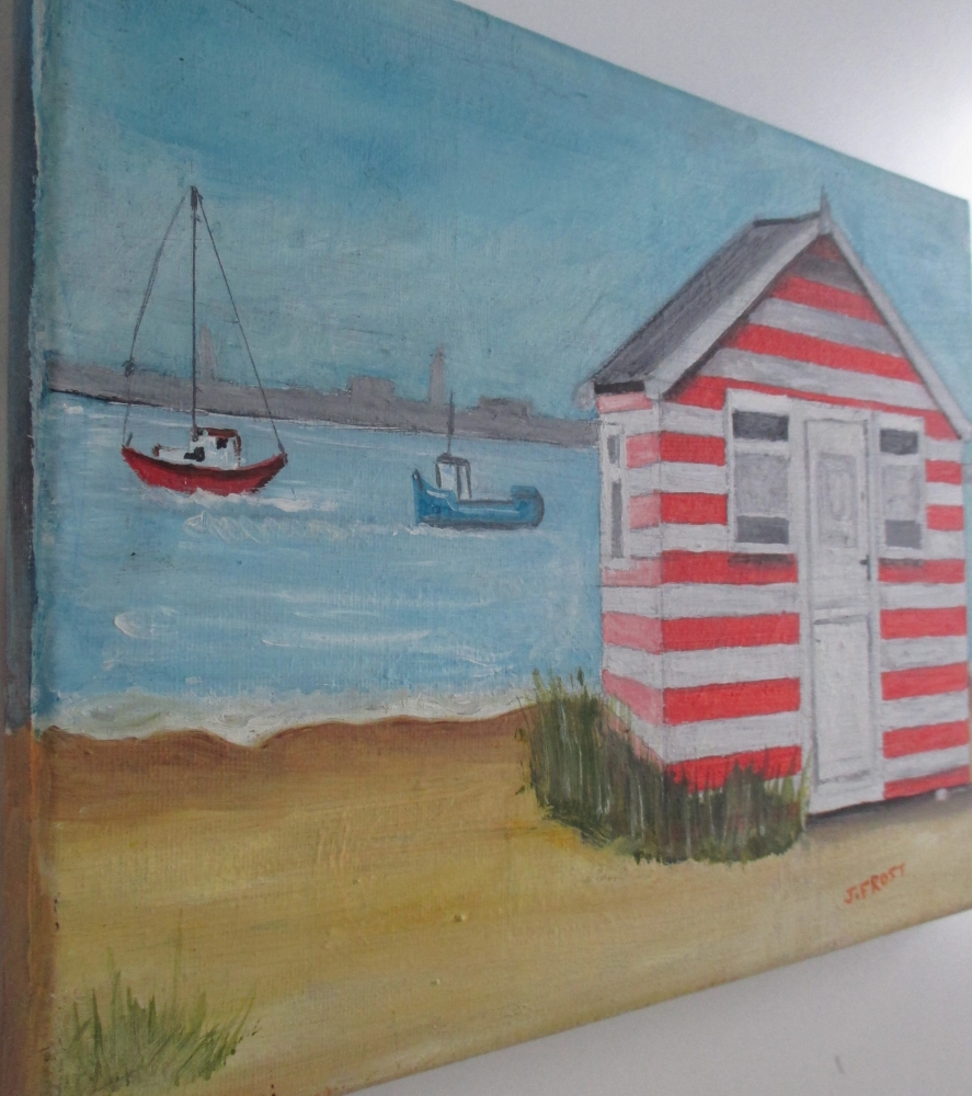 Beach hut and boats