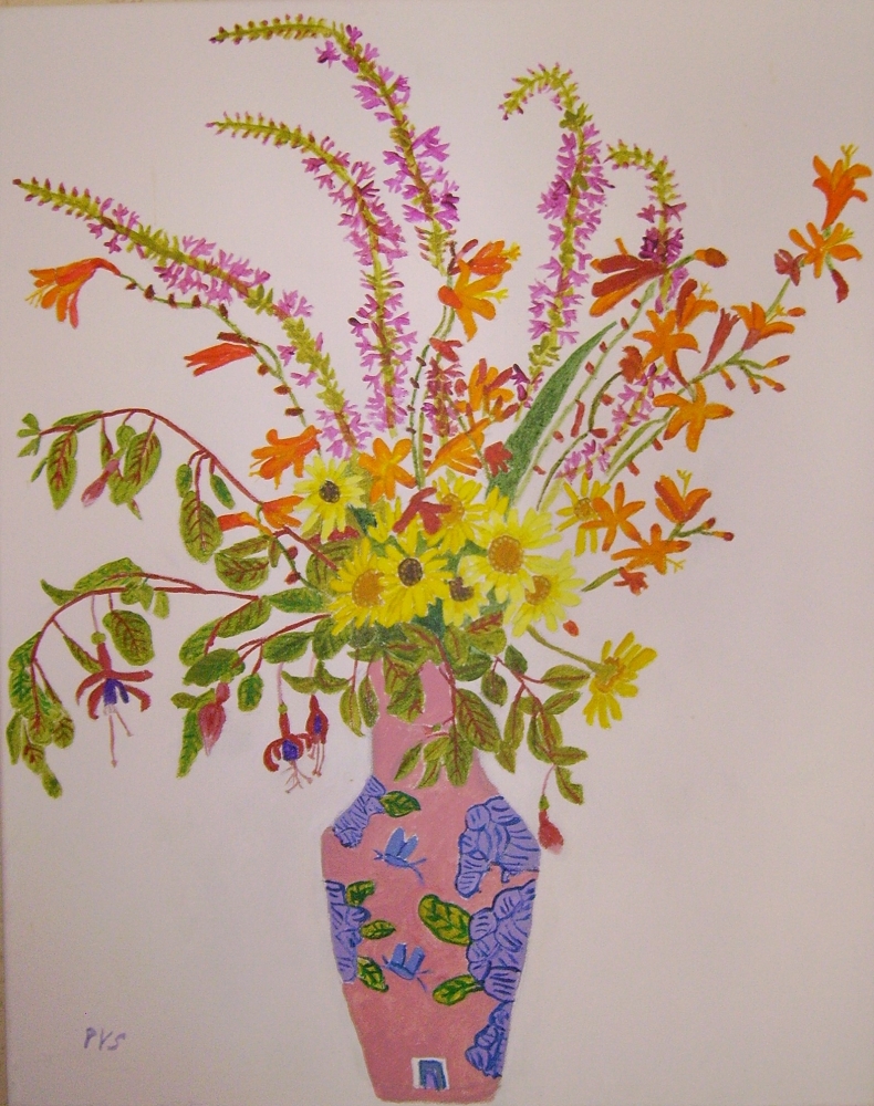 A Mixture of flowers in a two coloured vase.