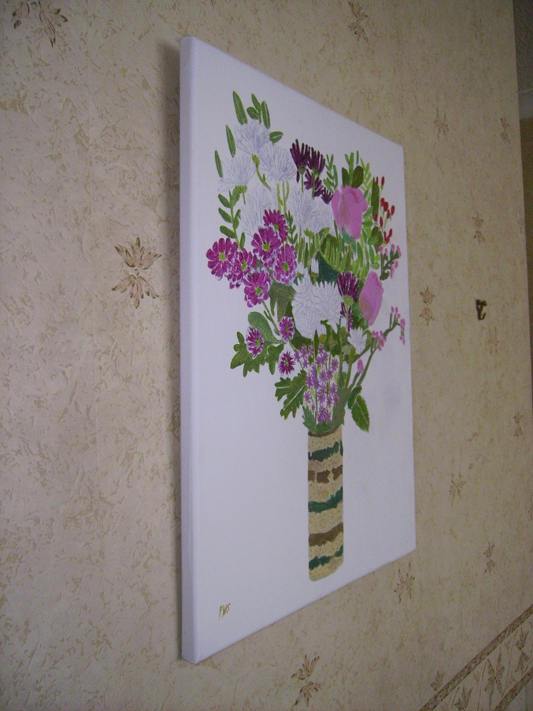 flowers in a striped pottery vase