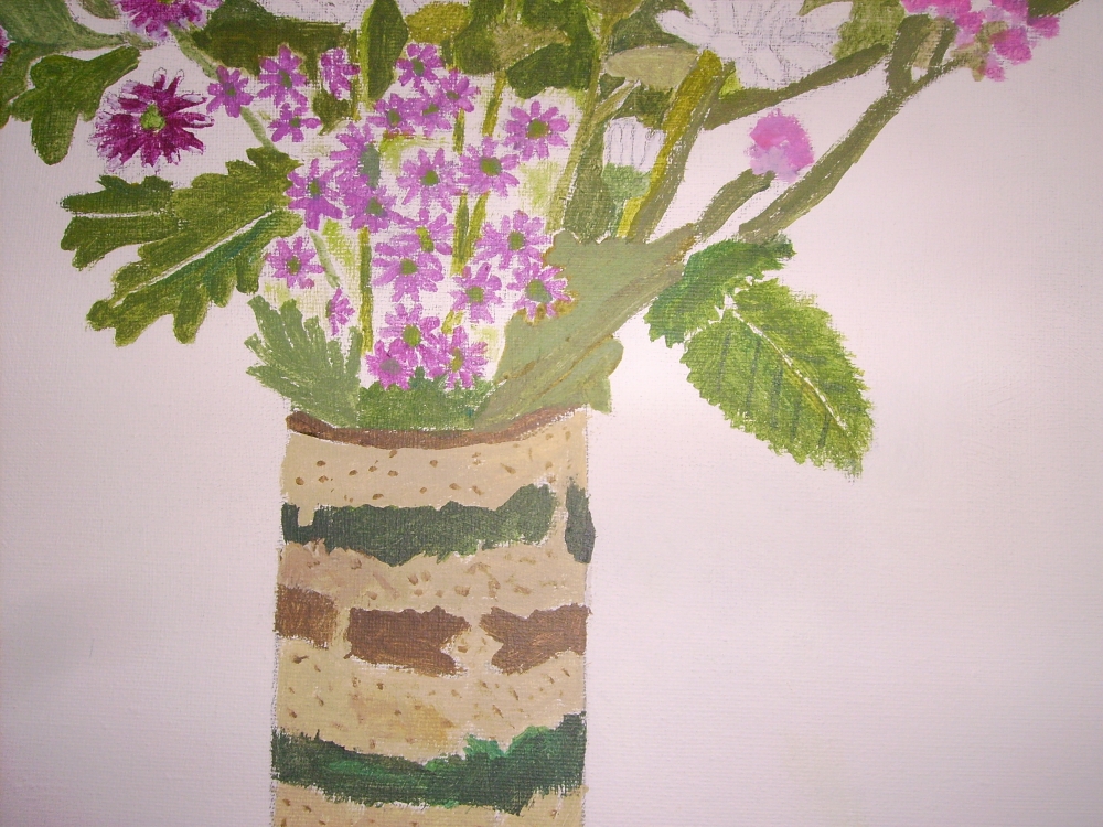 flowers in a striped pottery vase