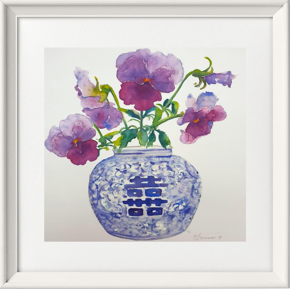 Oriental blue & white vase of purple pansies