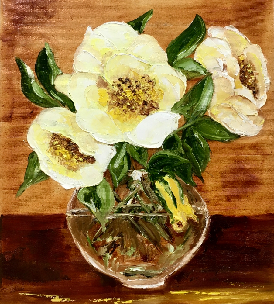 Bouquet of wild yellow roses in a vase on wooden table