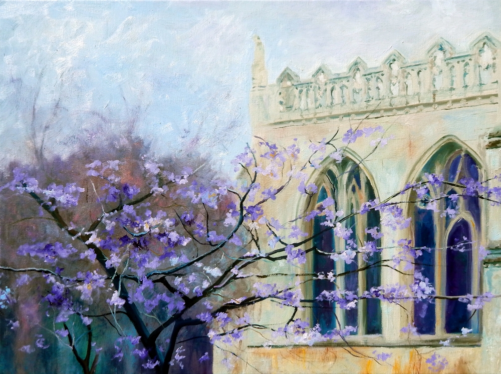 Peterborough cathedral with purple blossom tree