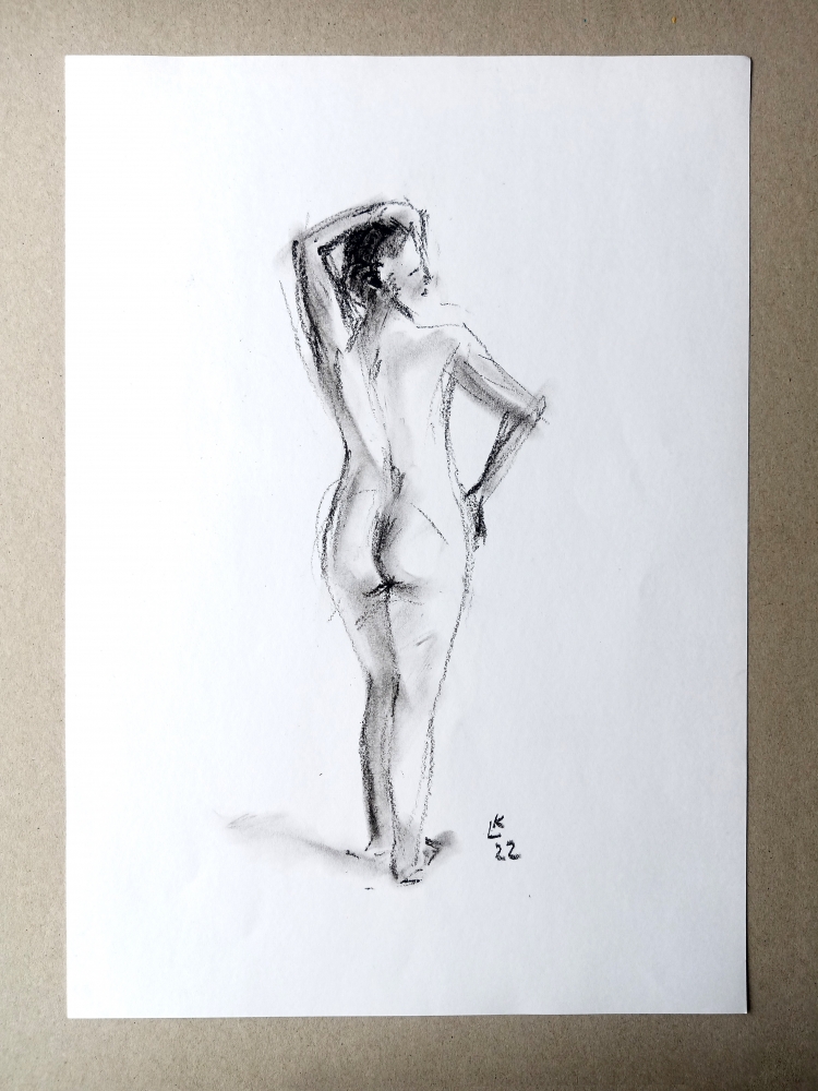 Nude woman standing back-2