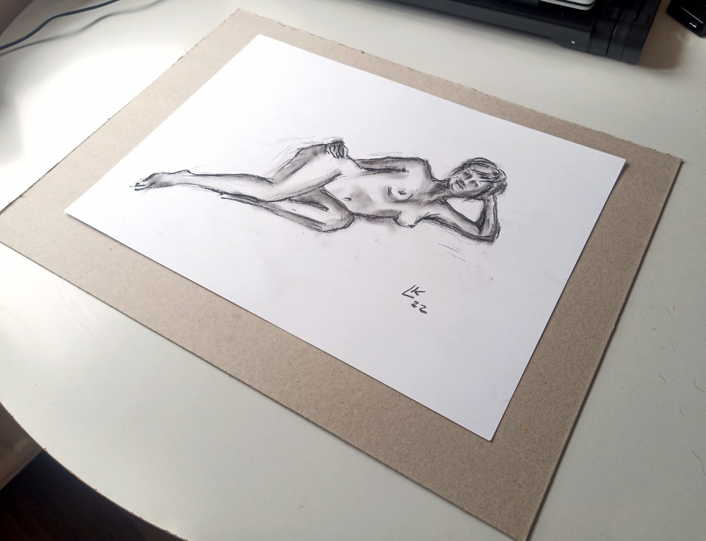 Nude woman is laying