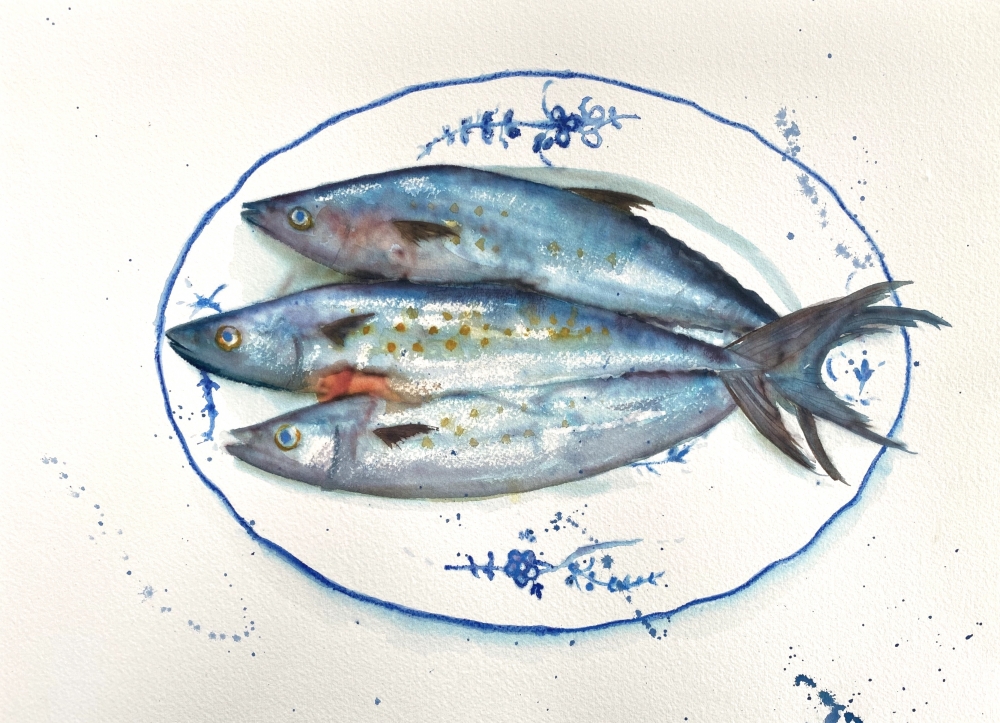 Fish on a blue and white plate