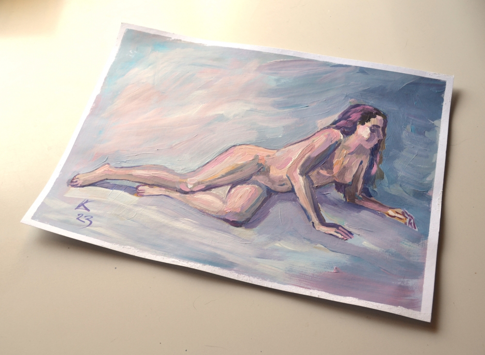 Nude woman figure on a blue background 