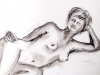 Nude woman is laying