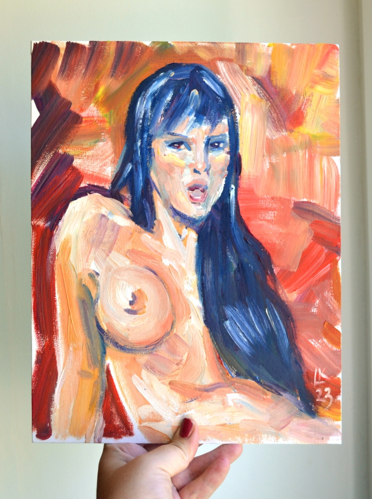 Nude woman on a red background