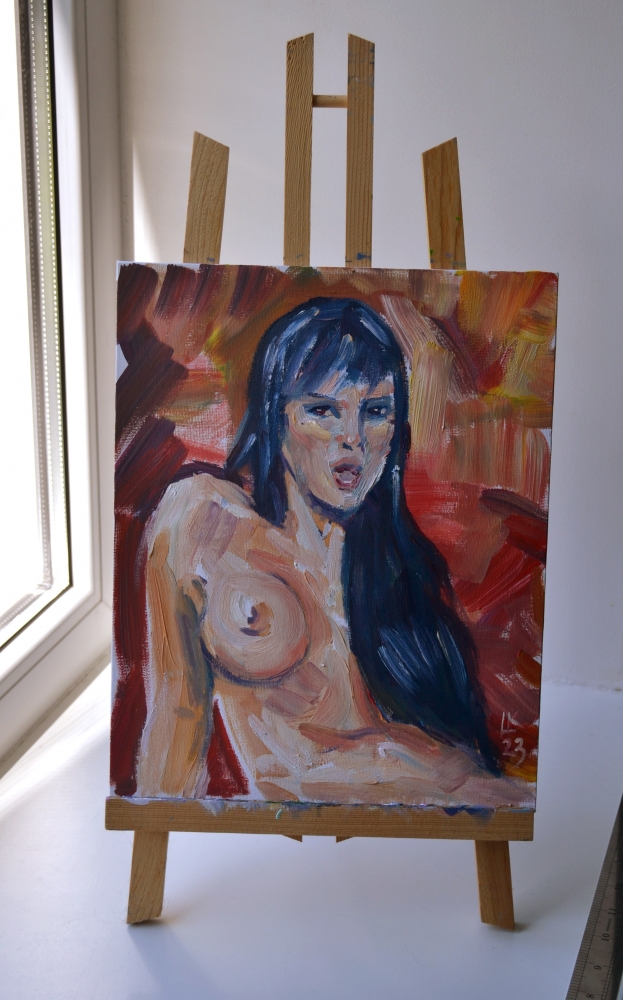 Nude woman on a red background