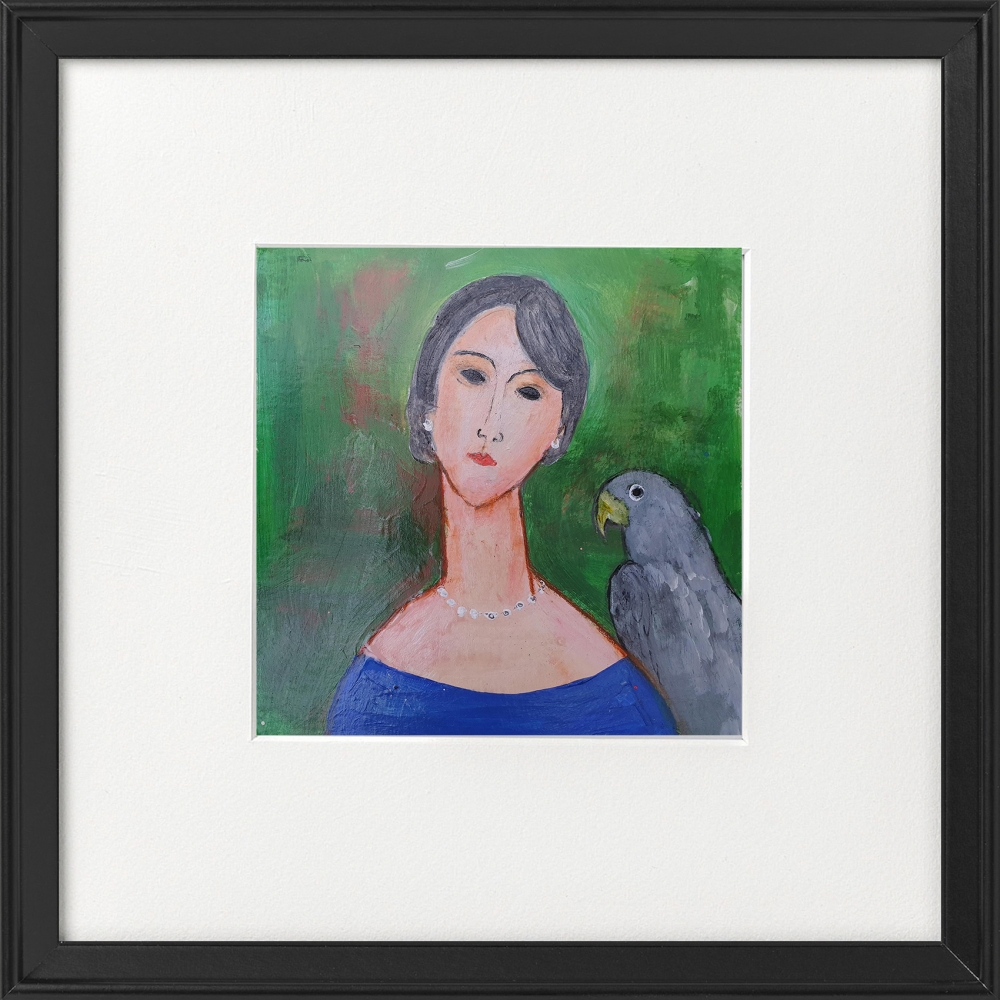 Woman with Grey Parrot framed