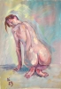 Nude woman sitting back