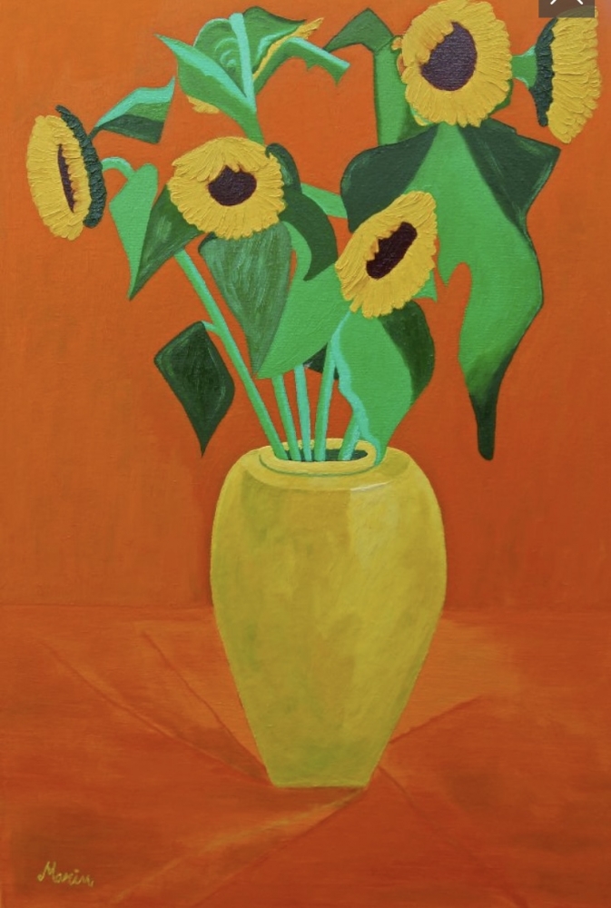 Sunflowers in a yellow vase