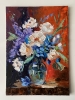 Bouquet of White flowers in a blue vase on red. Still life.