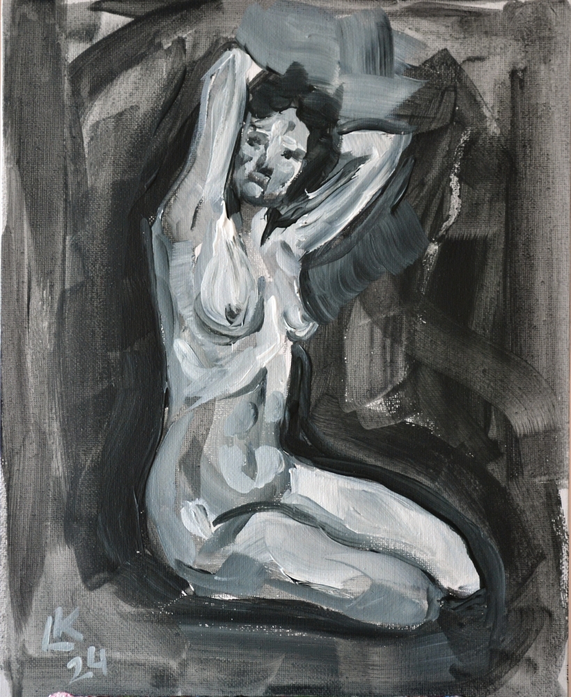 Nude woman sitting on her knees figure
