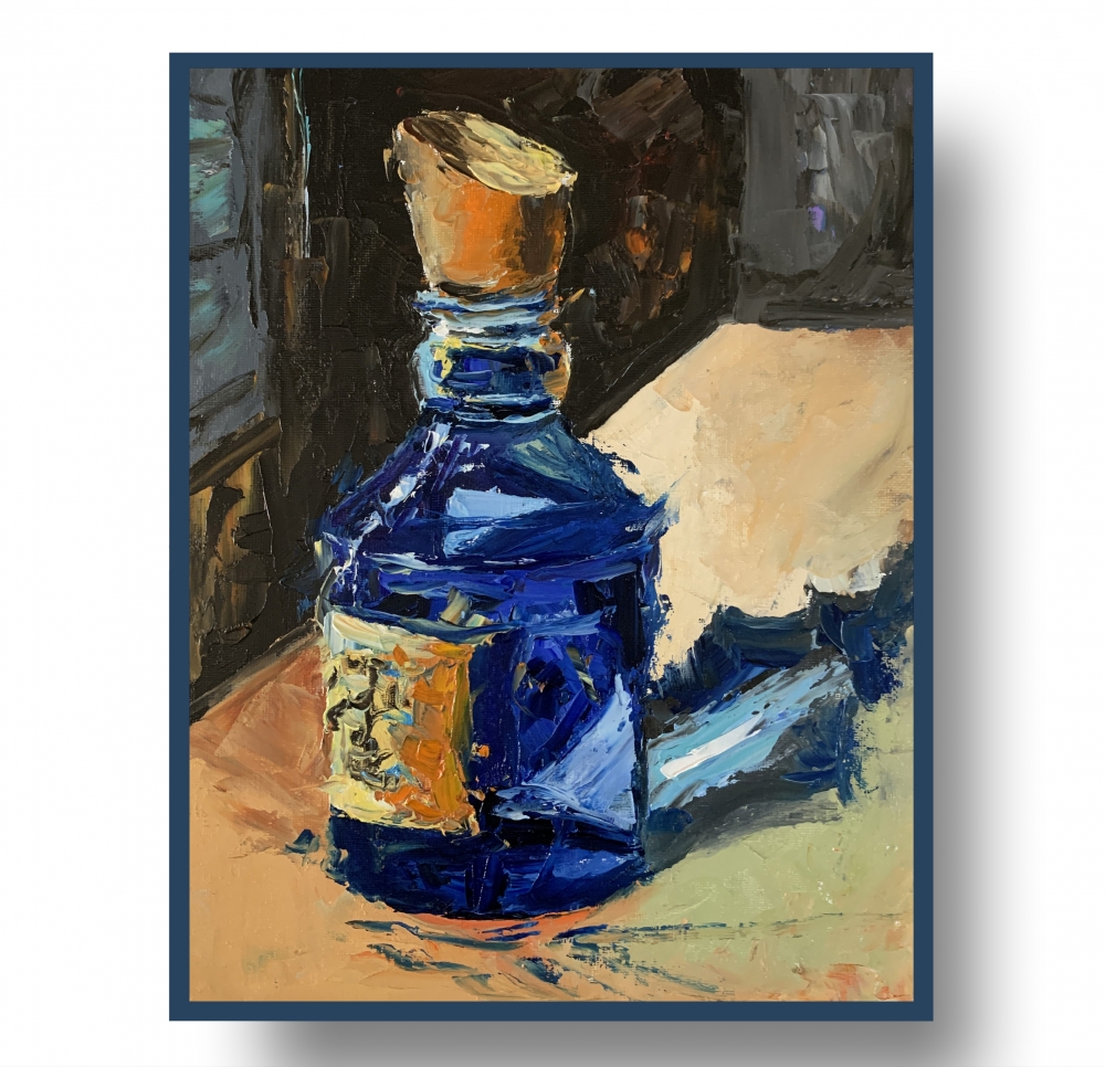 Mystery blue glass bottle, still life.