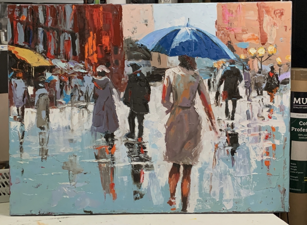 Rainy city. People with umbrellas.