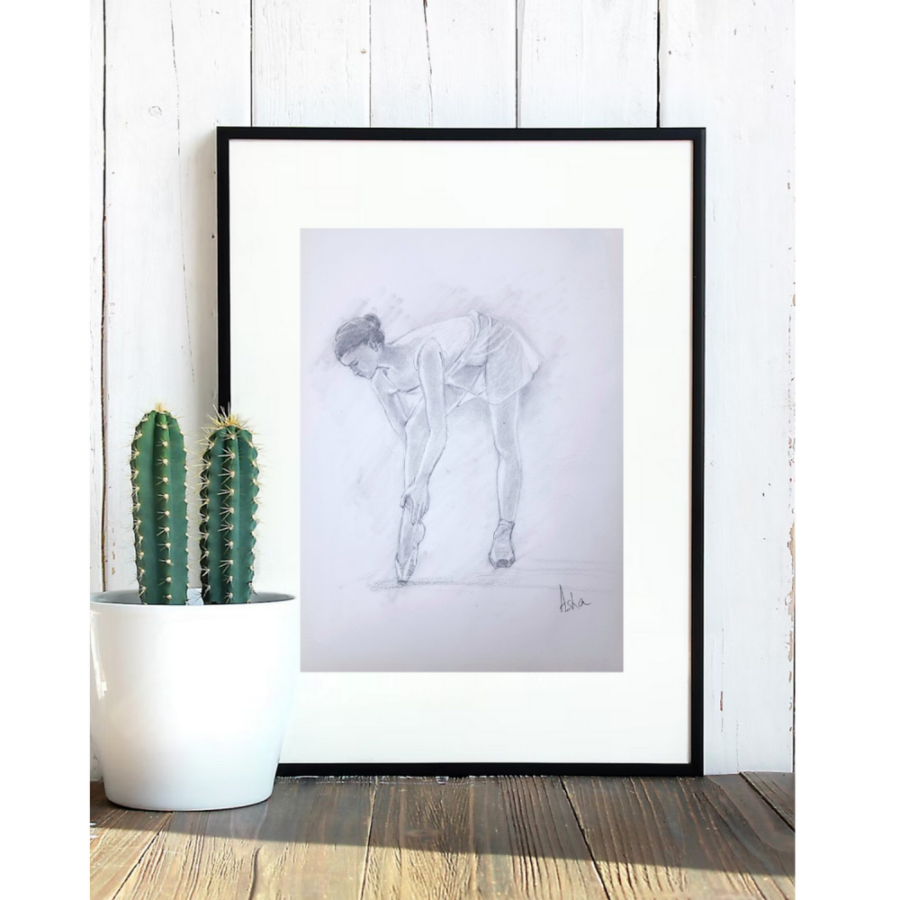 Ballerina adjusting her shoe