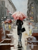 Woman with umbrella in a rainy city.