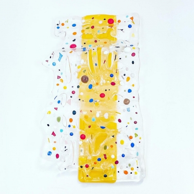 Yellow glass wave sculpture