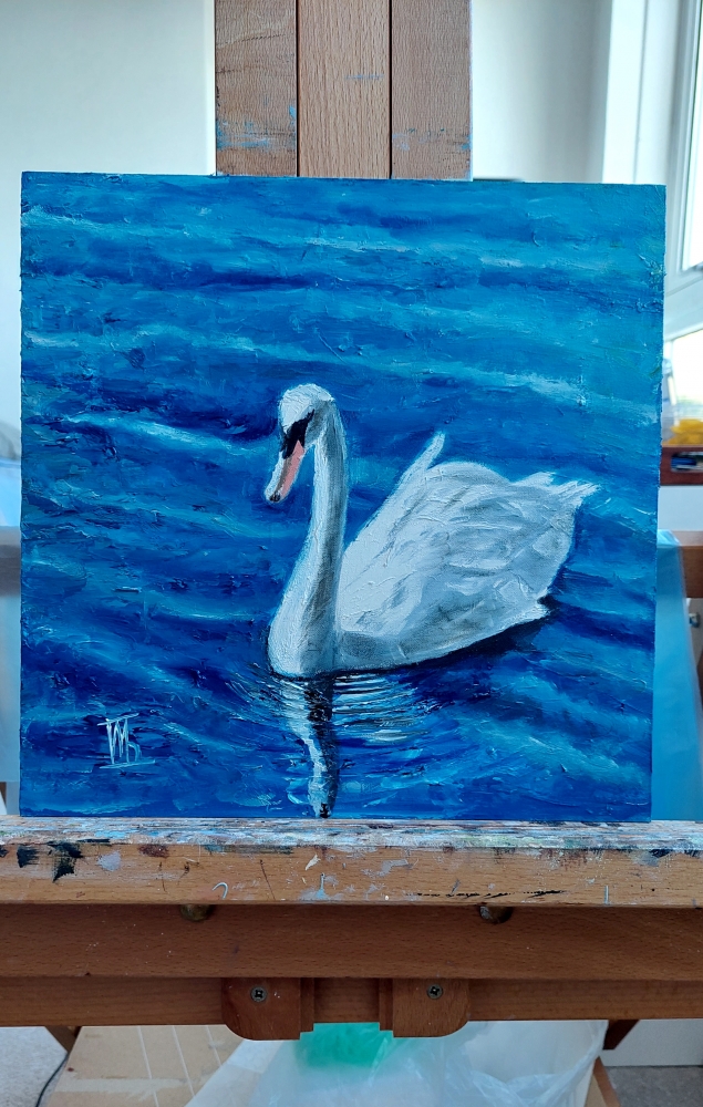 Swan and blue water