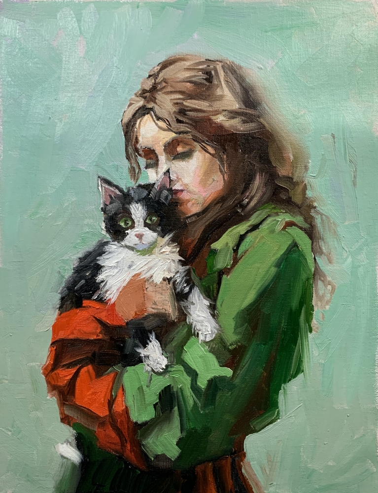 Girl in green dress with cat painting.