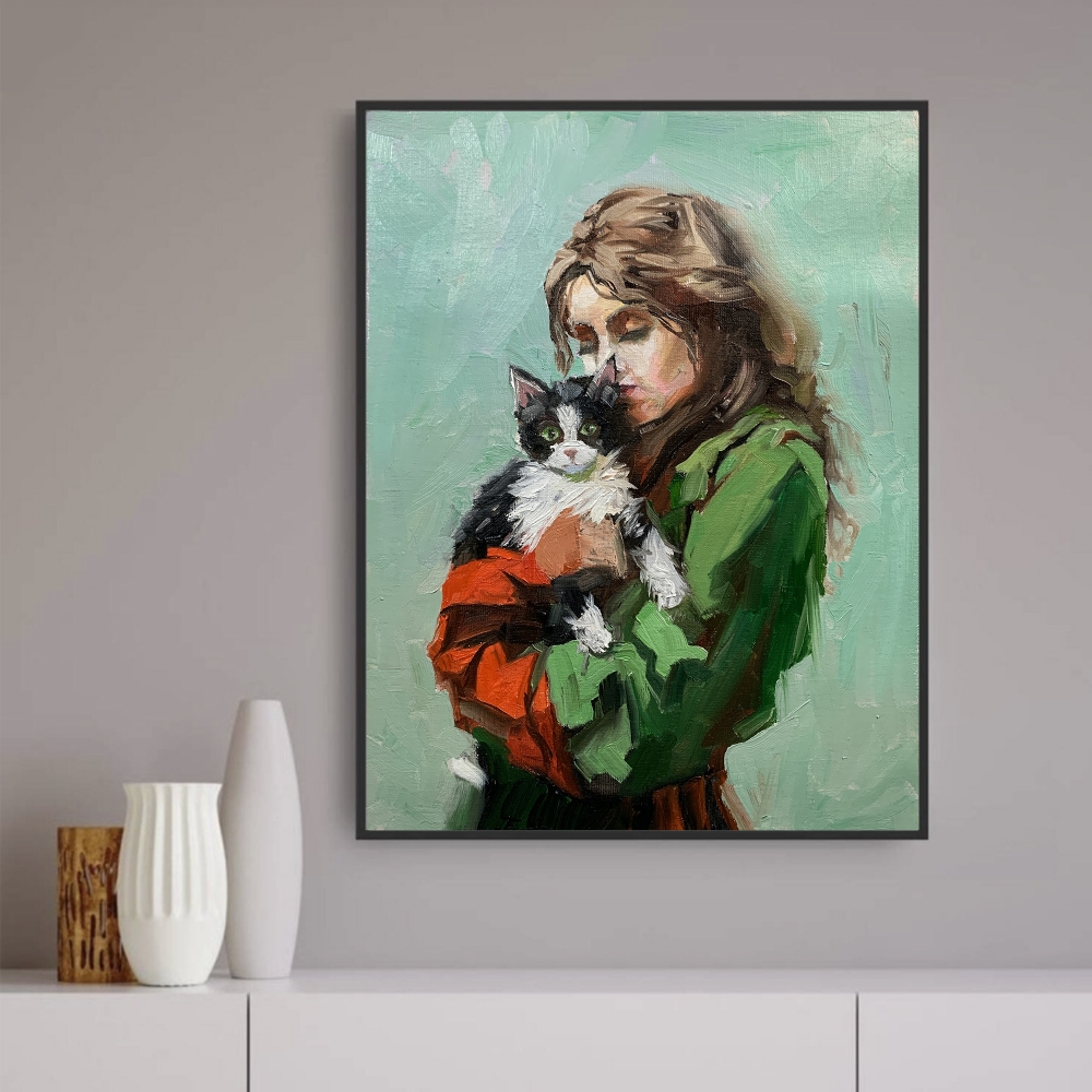 Girl in green dress with cat painting.