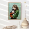 Girl in green dress with cat painting.