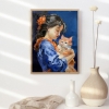 Girl in blue dress with orange cat