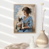 Girl in blue dress with cat.