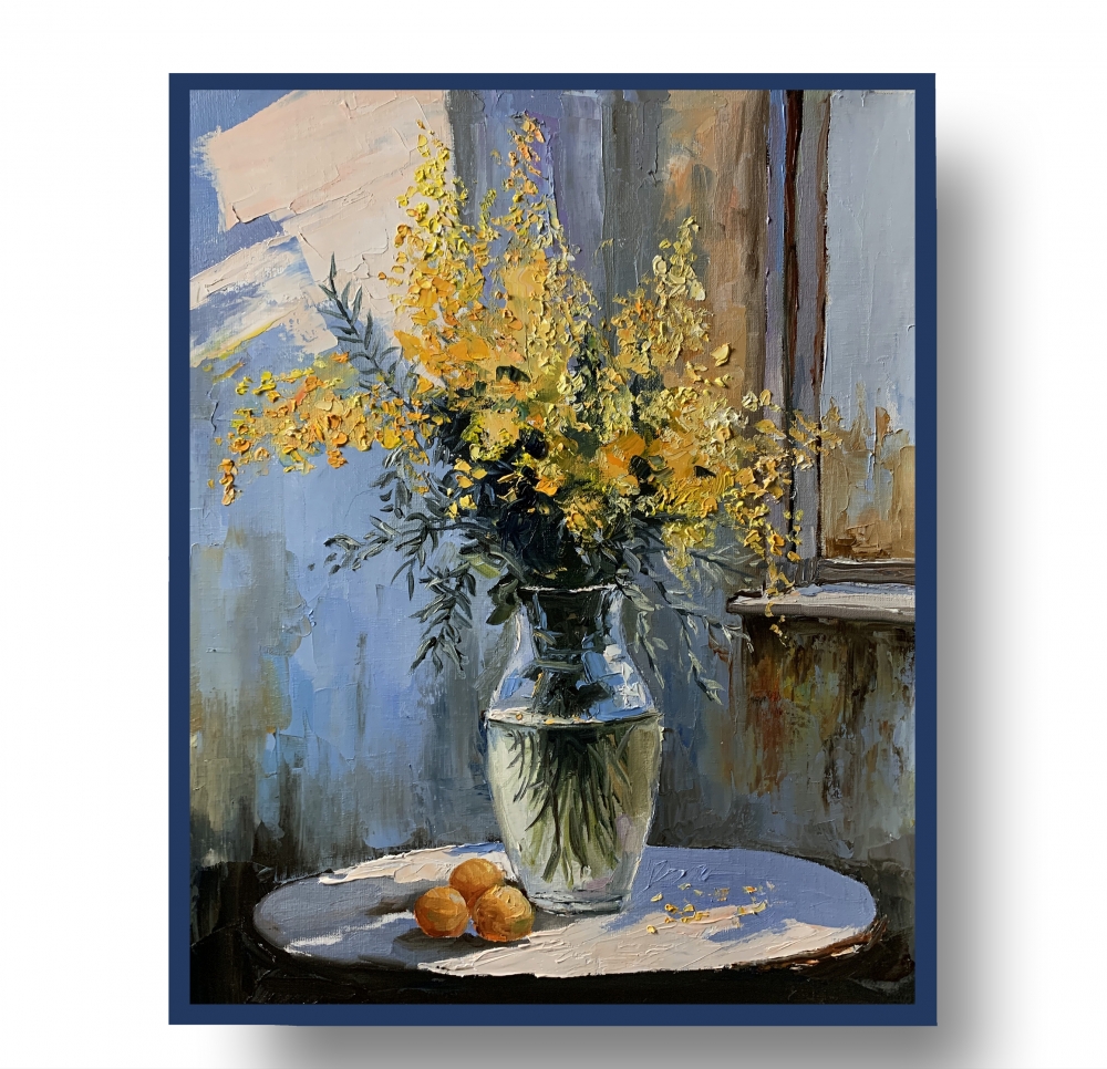 Bouquet of mimosa in a transparent vase by the window.