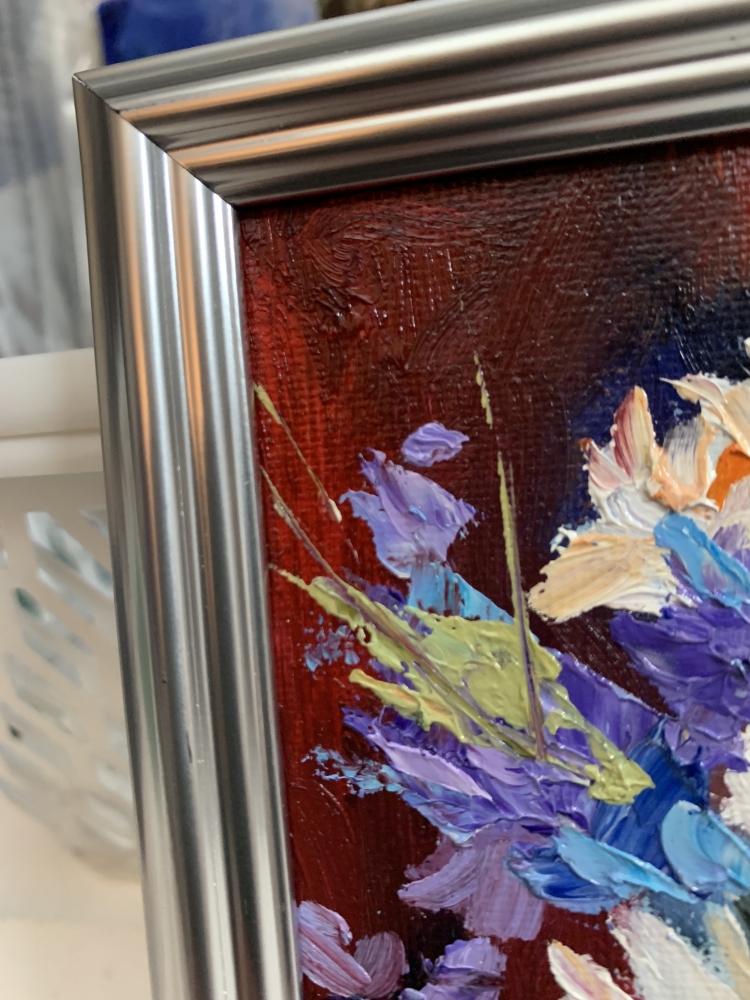 Bouquet of White flowers in a blue vase on red. Still life. xs