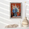 Bouquet of White flowers and bluebells in a blue vase on red. Still life.