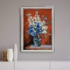 Bouquet of White flowers and bluebells in a blue vase on red. Still life.