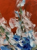 Bouquet of White flowers and bluebells in a blue vase on red. Still life.