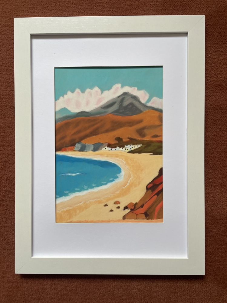 Quiet beach sheltered by mountains 