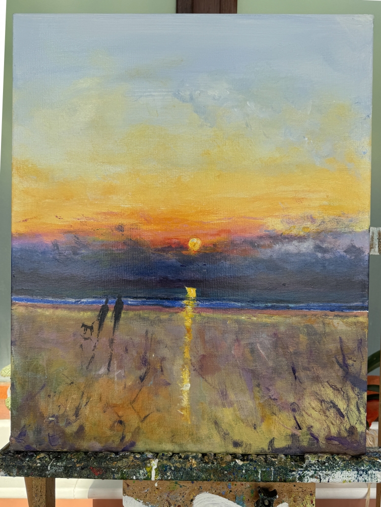 Seaside stroll with the dog, evening sunset