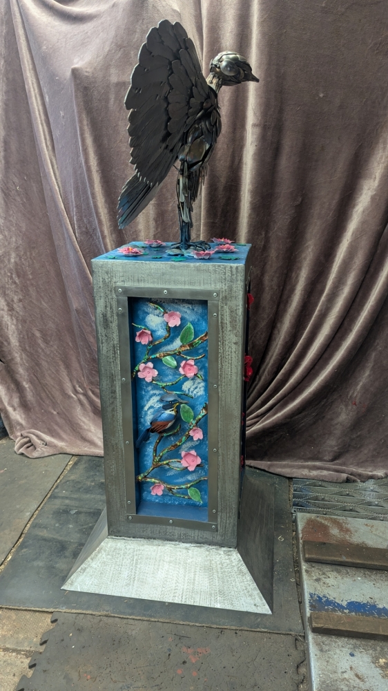 Sunbittern on a plinth
