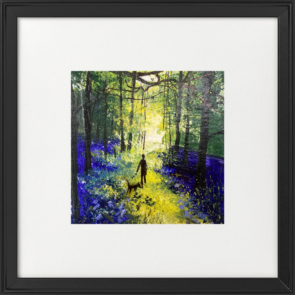Walk with dog among bluebells