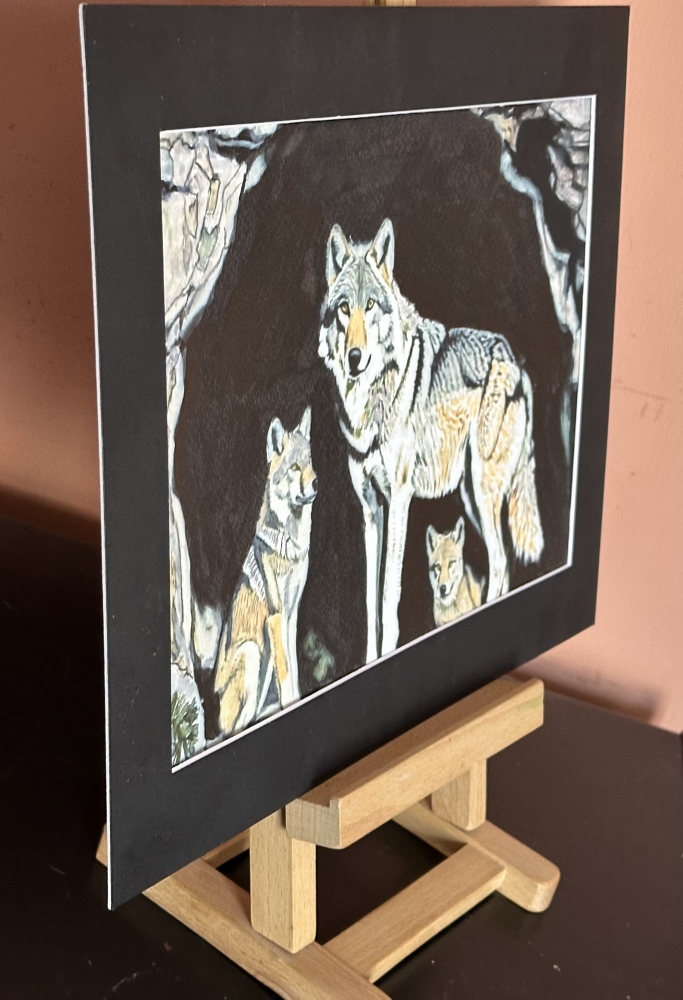 She wolf in Den with Pups 