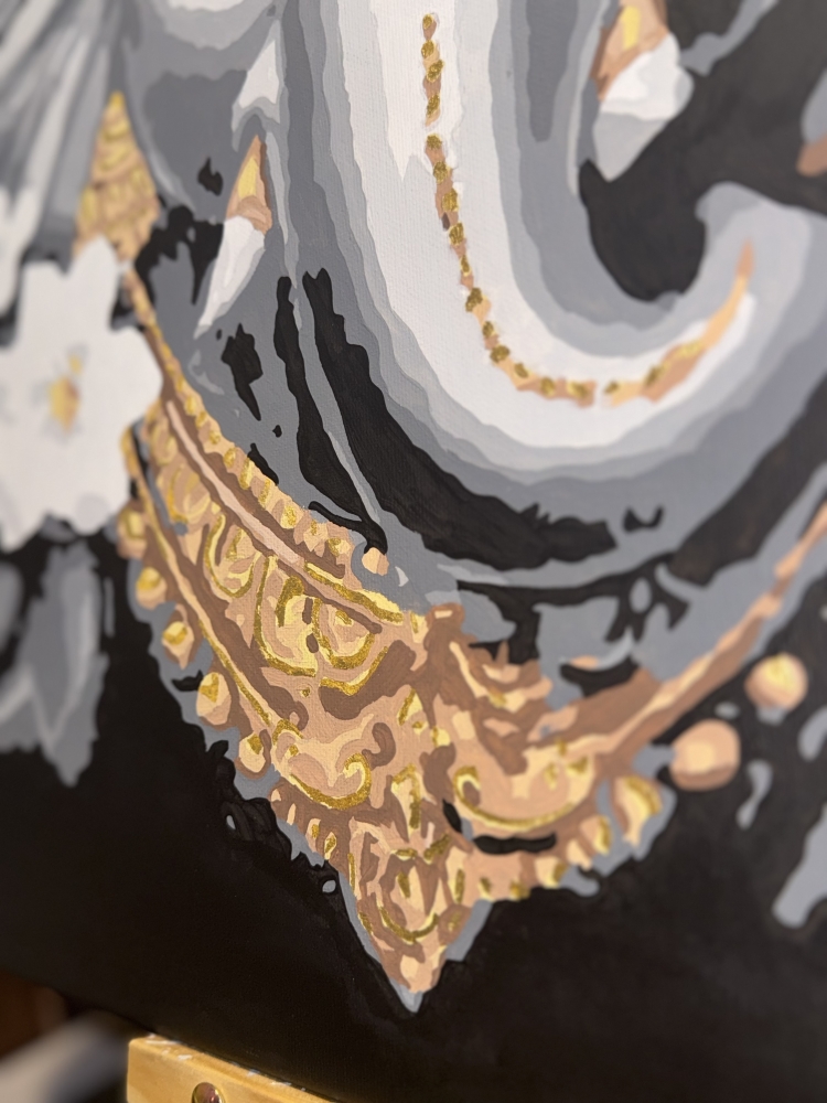 Divine Presence: Ganesha in Gold and Grace
