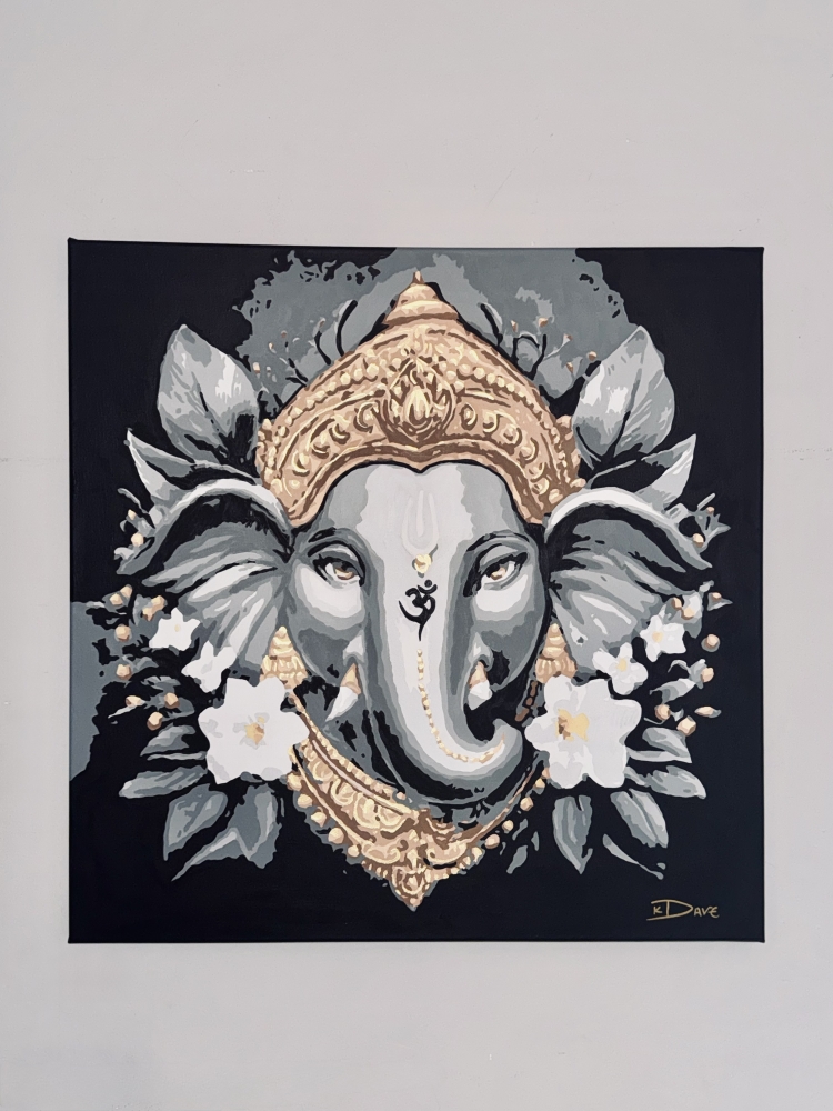 Divine Presence: Ganesha in Gold and Grace