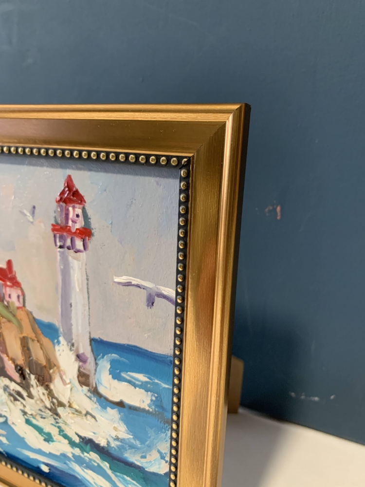 Seascape with lighthouse.