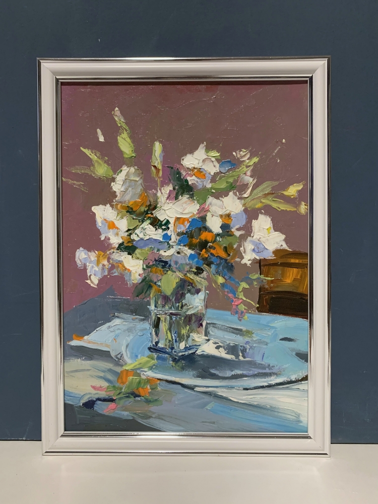 White flowers in a glass vase.